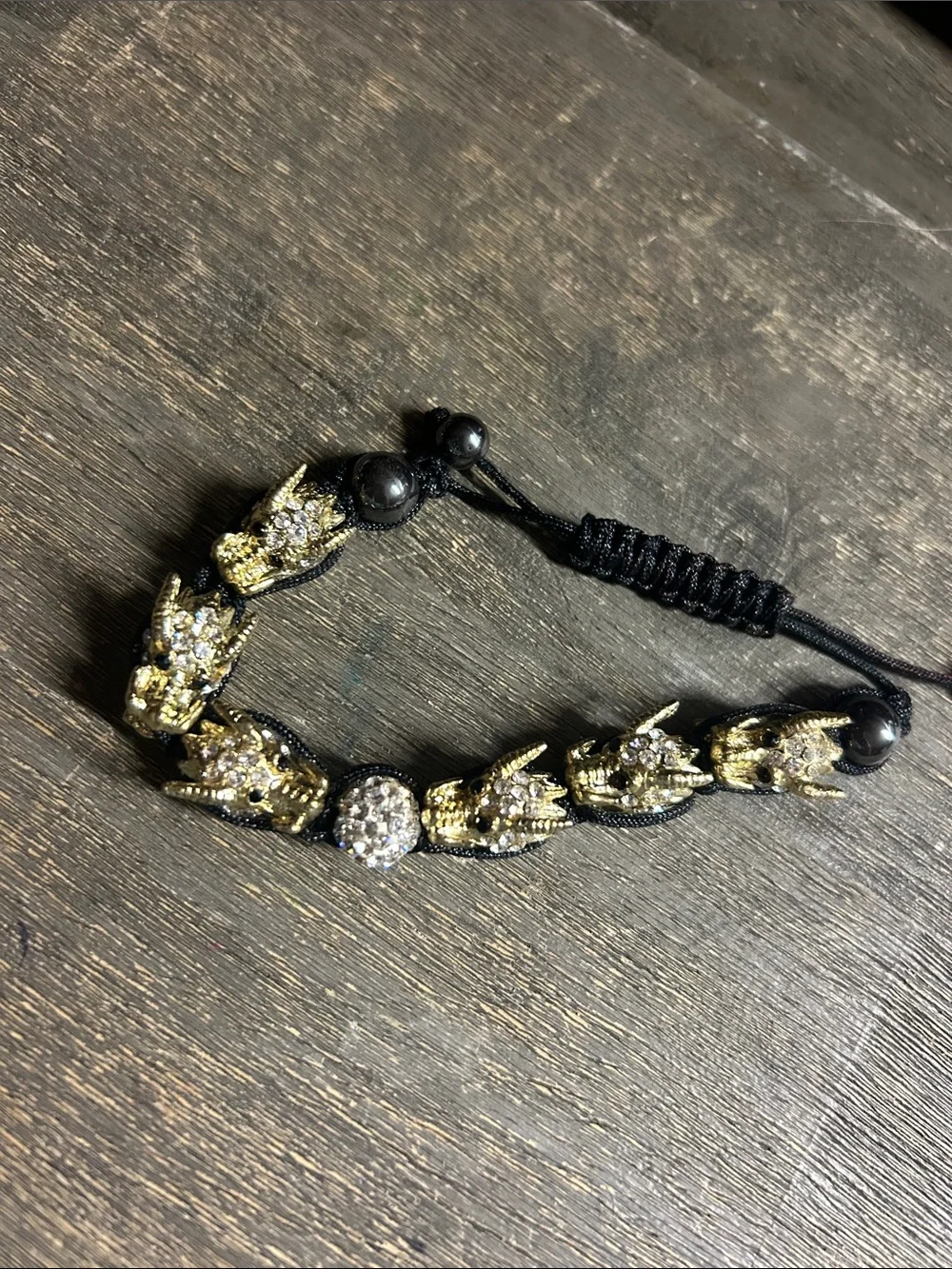 Gold Dragon Head Bead Bracelet with Black Cord